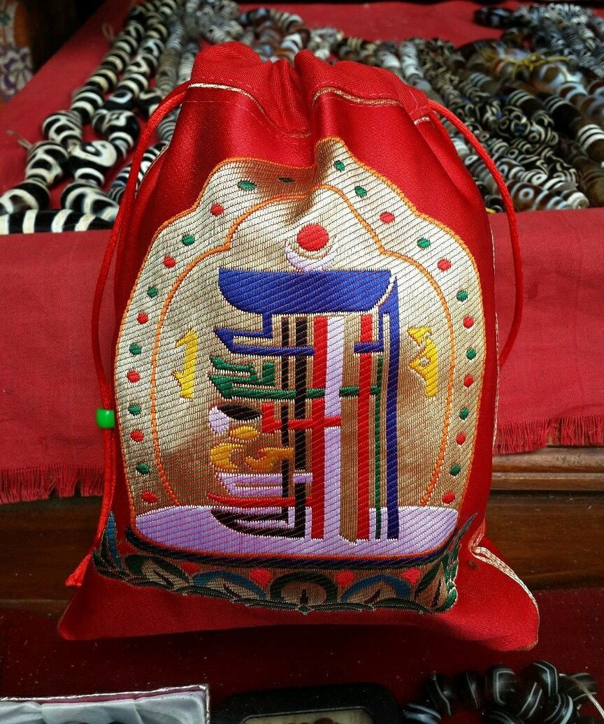 Pochettes/sacs à bijoux en brocart de soie tibétain de haute qualité avec motif Kalachakra rouge