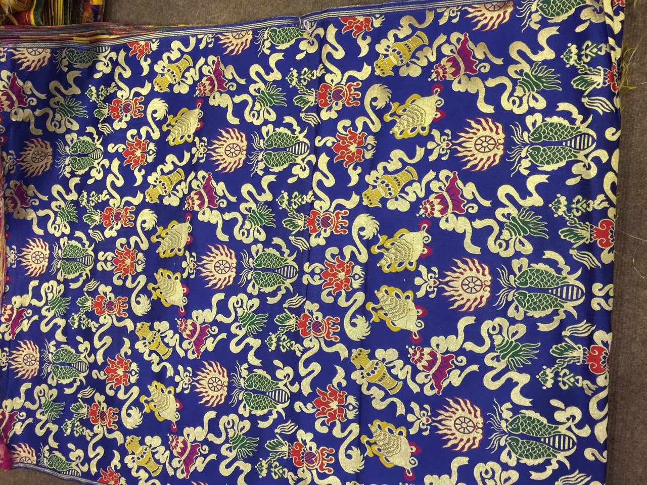 Tissus en brocart de soie bleu / soie avec symbole de bon augure tibétain