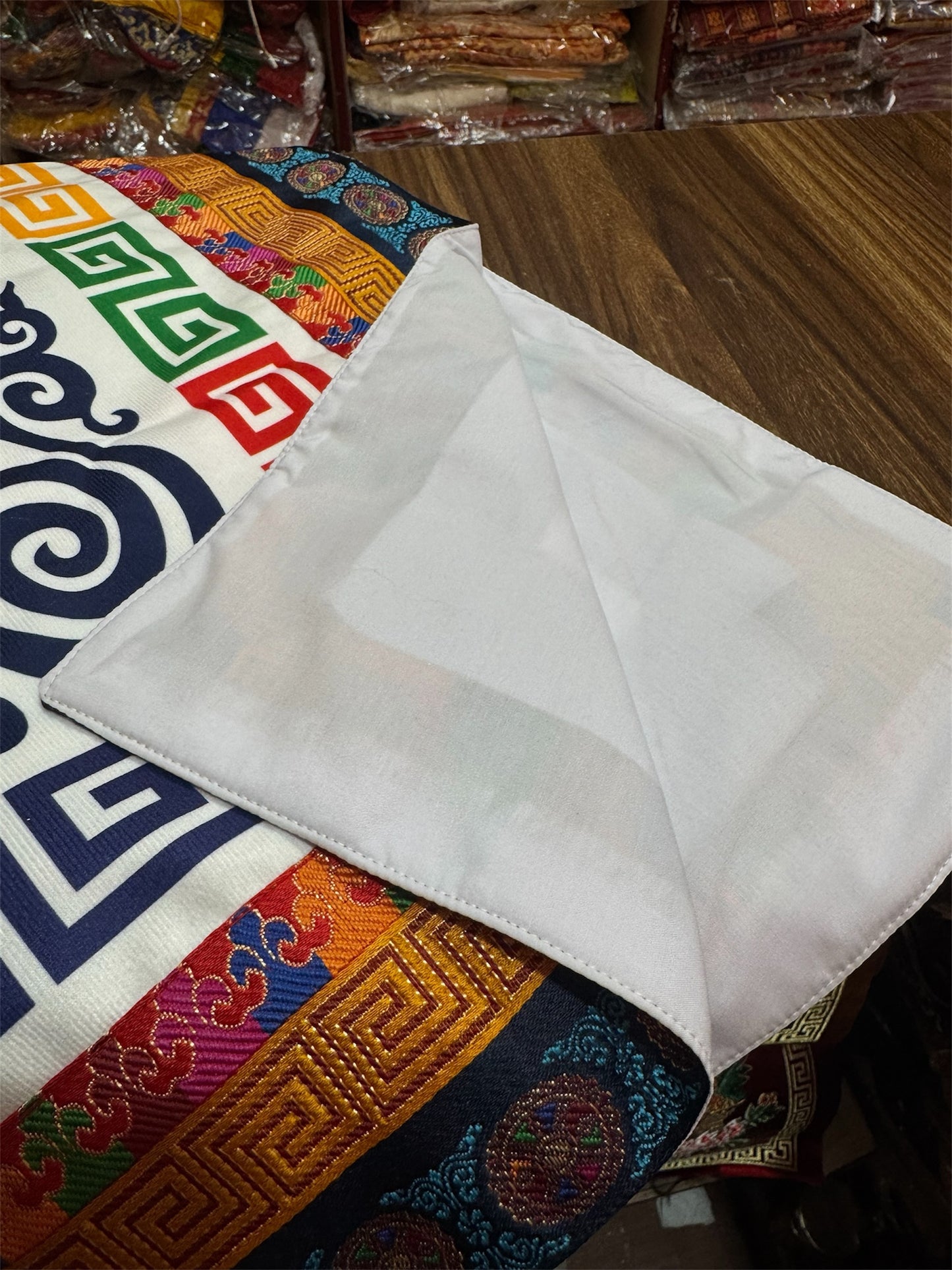 Tibetan brocade auspicious symbol table cover with wheel of life border / altar cloth