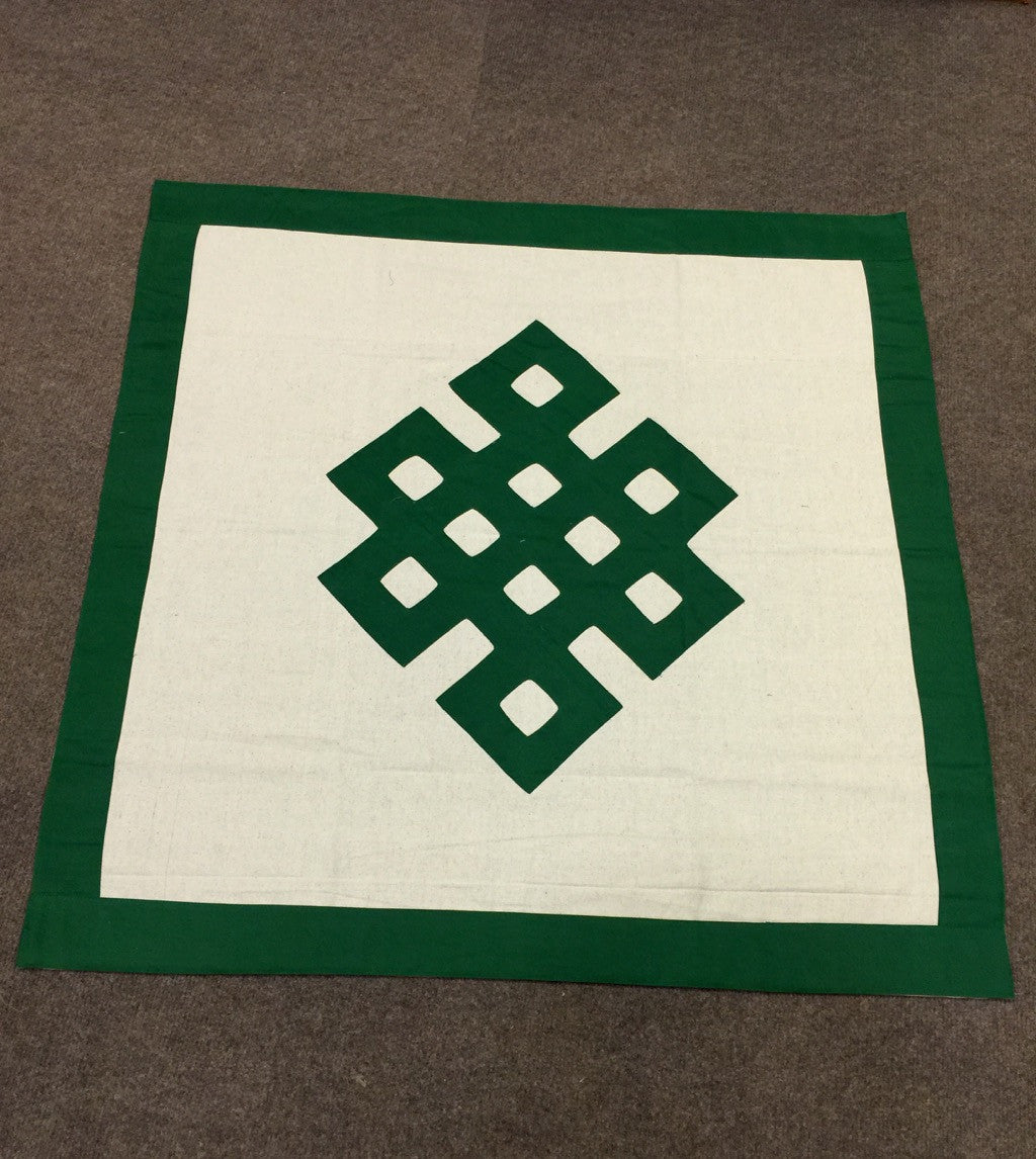 This is high quality square table cover made up of 100 percent pure cotton fabric . This table cover is made in nepal with Tibetan traditional endless knot patch work design . It can be used to decorate your meditation room or add oriental style in any part of your home.