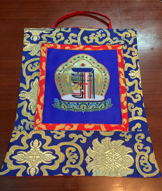 This is high quality silk brocade kalachakra wall hanging, bordered with beautiful lotus design silk brocade . This thangka is perfect for your office , dharma centers , shrine room or puja room.