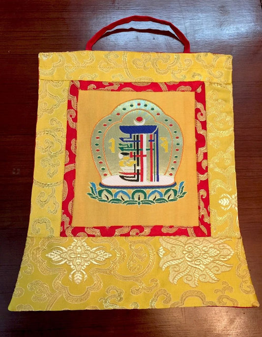 This is high quality silk brocade kalachakra wall hanging, bordered with beautiful lotus design silk brocade . This thangka is perfect for your office , dharma centers , shrine room or puja room.